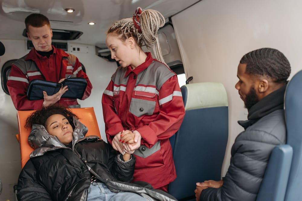 an injured woman in a rescue vehicle